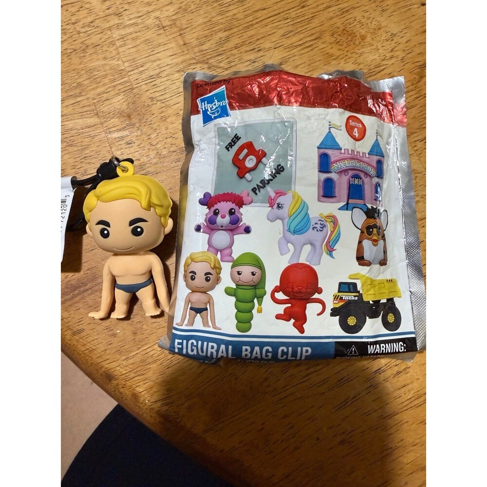 Stretch Armstrong 3D foam figural bag clip from the Monogram